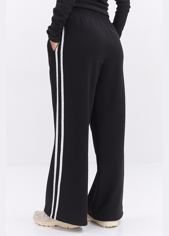 Широкие женские спортивные штаны черные с лампасами по бокам Arjen (317233900)