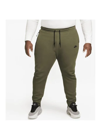 Спортивні штани M NK TCH FLC JGGR оливкові FB8002-222 Nike (397840139)