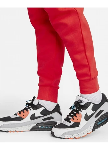 Оранжевые брюки Nike
