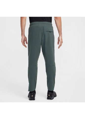 Серые демисезонные брюки Nike