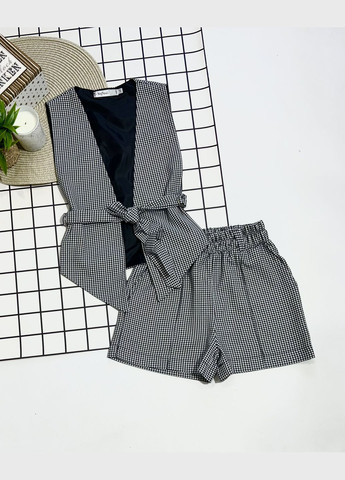 Костюм шкільний для дівчинки жилетка та шорти 128-158 No Brand (346058474)