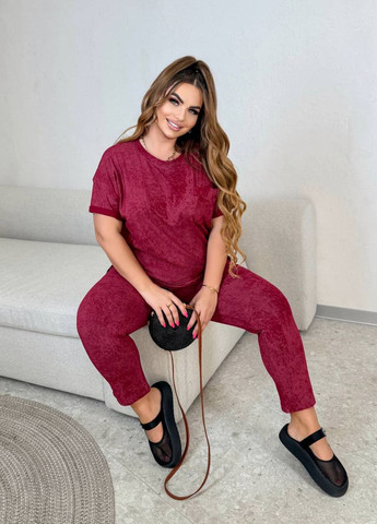 Легкий трикотажний жіночий костюм з ефектом варенки Modena (338537557)