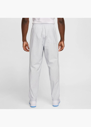 Белые демисезонные брюки Nike