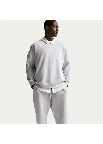 Серые демисезонные брюки Nike