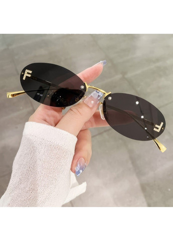 Сонцезахисні окуляри без оправи Fantasy чорні із золотом No Brand (294335236)