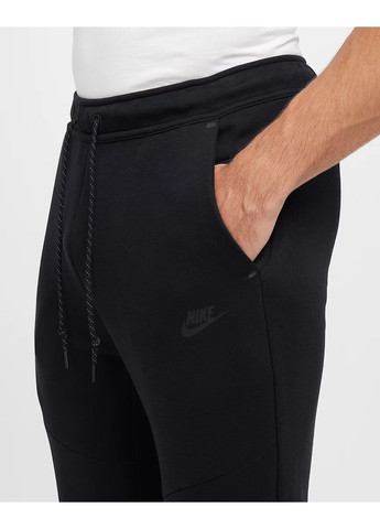 Черные демисезонные брюки Nike