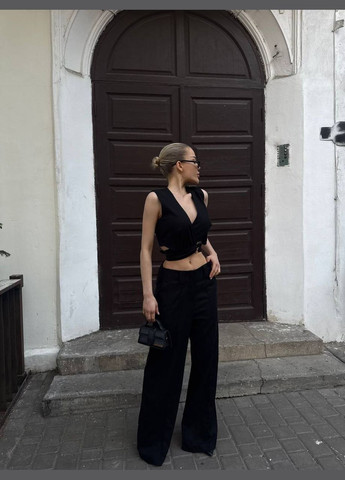 Женский брючный костюм из льна. Adelante (332006639)