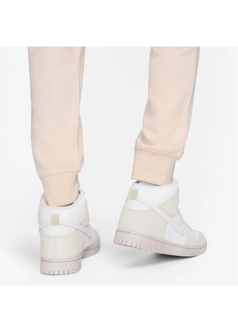 Розовые брюки Nike