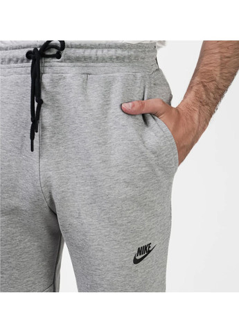 Серые демисезонные брюки Nike