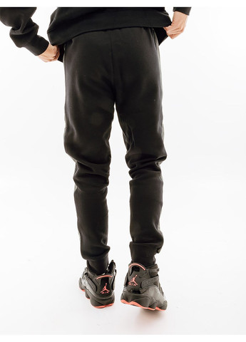 Черные спортивные демисезонные брюки Nike