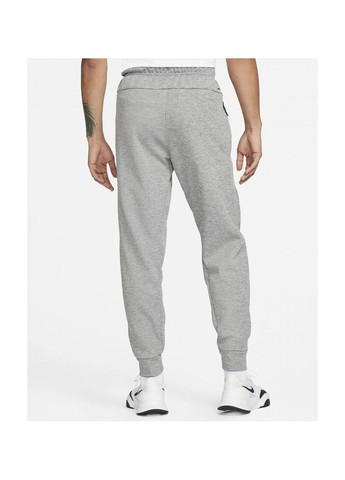 Серые демисезонные брюки Nike