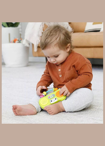 Іграшка музична Міні-програвач із музикою та світлом (307038) Infantino (330057577)