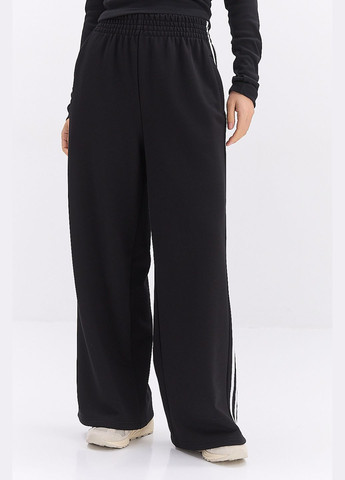 Широкие женские спортивные штаны черные с лампасами по бокам Arjen (317233900)