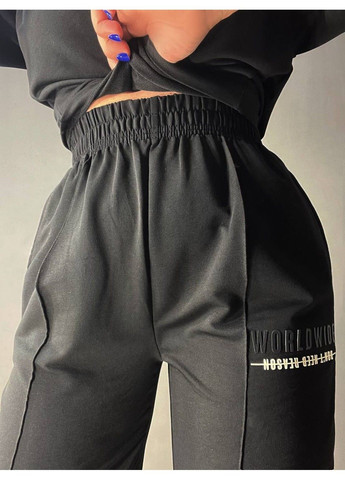 Костюм женский 101216 оверсайз футболка с джогерами со швом и надписью черный CAPPITONE (329039760)