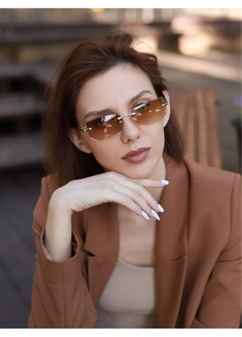 Сонцезахисні окуляри унісекс без оправи Trend коричневі із золотом No Brand (307183742)