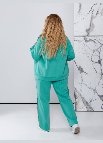 Жіночий костюм з мереживними вставками Style Point (342075817)