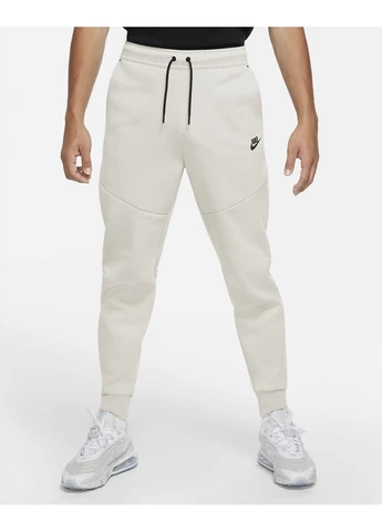 Бежевые демисезонные брюки Nike