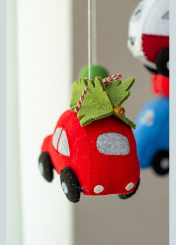 Дитячий музичний мобіль на ліжечко для немовлят WooolyWool «Святкові машинки» з 35 мелодіями No Brand (342758033)