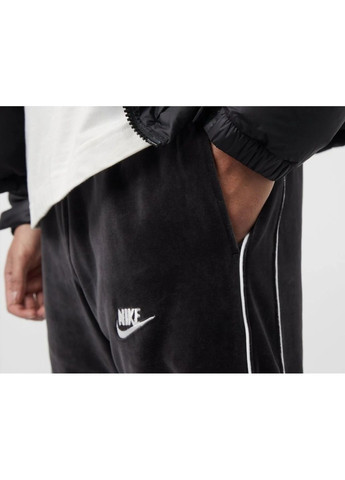 Черные демисезонные брюки Nike