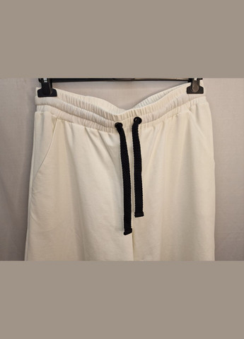 Брюки женские белые трикотажные укороченные широкие Modna KAZKA MKKS204-1 KAPTSOVA (336933451)