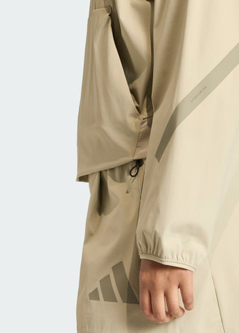 Коричнева демісезонна бомбер z.n.e. woven adidas