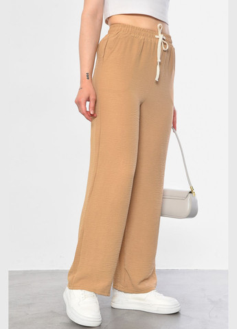 Штаны женские с ткани жатка бежевого цвета Let's Shop (296984212)