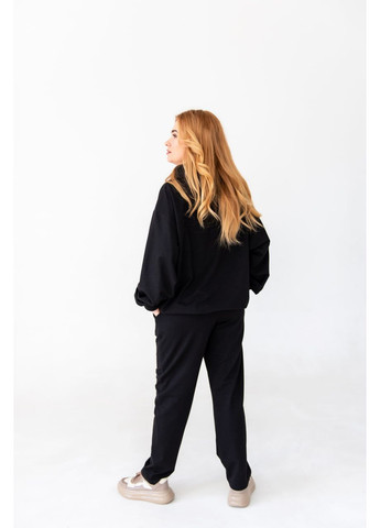 Черные свободные однотонные повседневные хлопковые спортивные штаны джоггеры из хлопка на манжетах с карманами женские оверсайз No Brand (362419425)