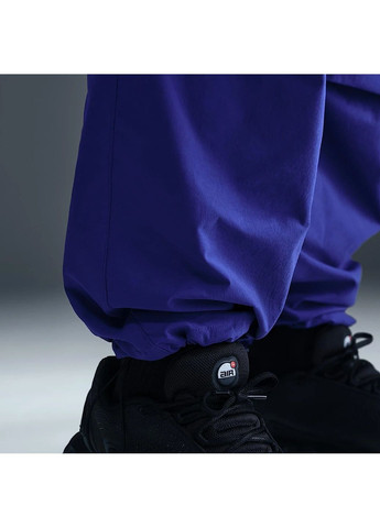 Синие демисезонные брюки Nike