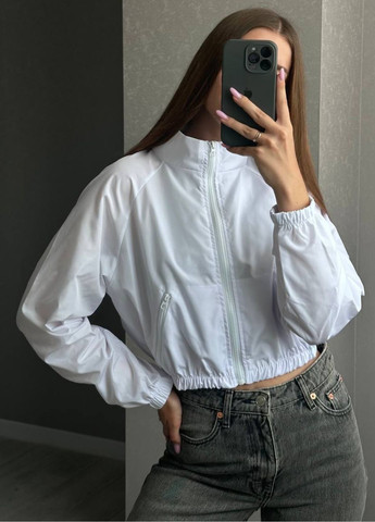 Базовая повседневная демисезонная укороченная ветровка на молнии с рукавами реглан, карманами и стойкой воротником Україна (328432641}