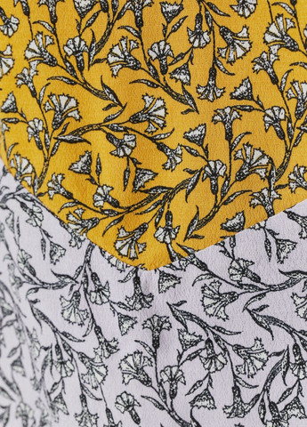 Желтая цветочной расцветки юбка H&M