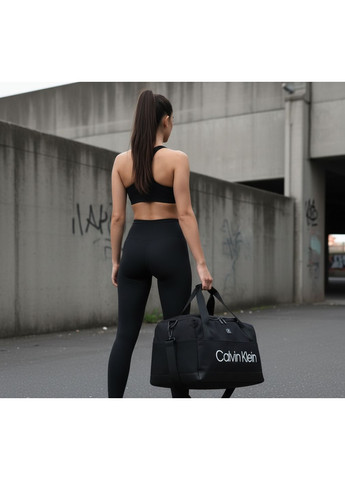 Об'ємна спортивна сумка стильна практична вологостійка для фітнесу тренувань містка зручна Calvin Klein (360978014)