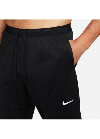 Черные демисезонные брюки Nike