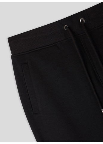 Черные зимние брюки Terranova