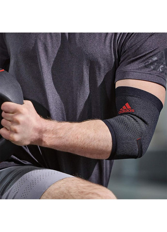 Фіксатор ліктя Performance Elbow Support чорний,червоний Уні adidas (333956595)