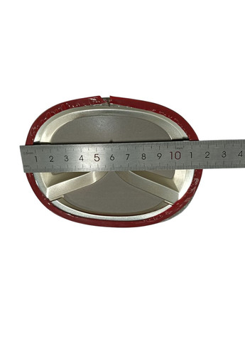 Емблема решітки 3 (2013-2016р) чорна+хром 117х95 мм під склом (на скотчі) Mazda (369610542)