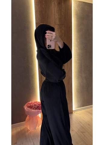 Жіночий велюровий комбінезон з капюшоном та акцентом на талії MonCher комбінезон-брюки чорний повсякденний велюр