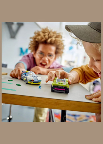 Конструктор City Переслідування маслкара на поліцейському автомобілі (60415) Lego (333253101)