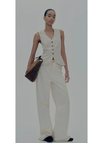 Жіночий приталений жилет Н&М (58094) XS Світло-бежевий H&M (317635165)