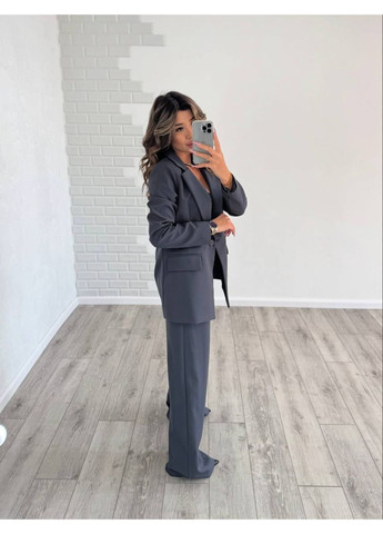 Класичний жіночій костюм чорного кольору No Brand С 1497 061 (370147812)