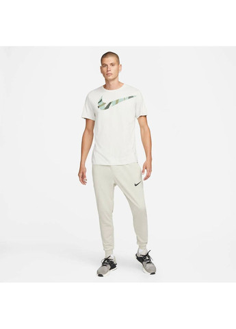 Бежевые демисезонные брюки Nike