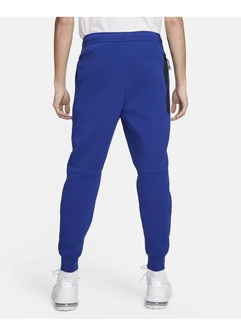 Синие демисезонные брюки Nike