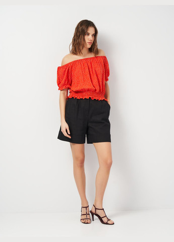 Помаранчева блуза в крапку C&A