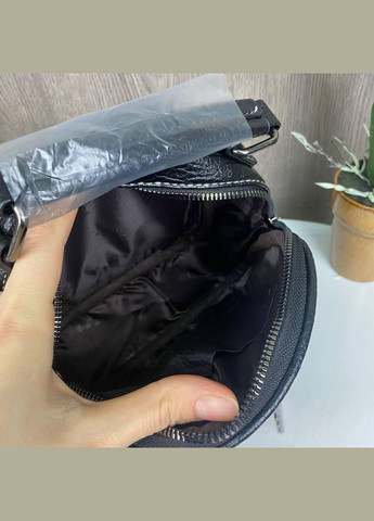 Жіноча міні сумочка на плече з екошкірою овальна чорна (sku_1062Ч) No Brand (330576627)