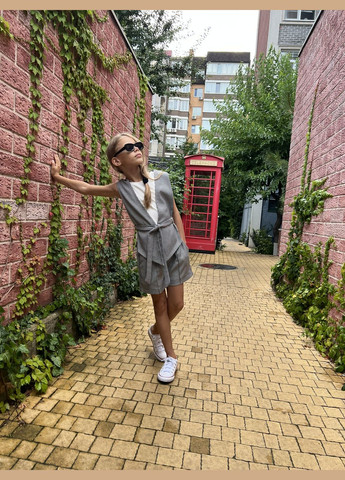 Костюм шкільний для дівчинки жилетка та шорти 128-158 No Brand (346058474)