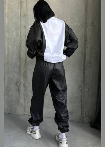 Черно-белая демисезонная ветровка женская черно-белого цвета Let's Shop