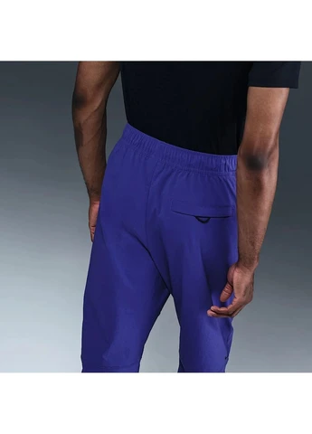 Фиолетовые демисезонные брюки Nike