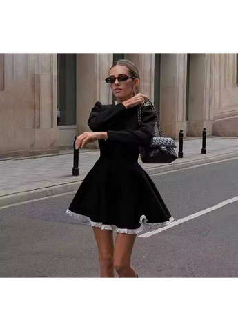 Черное повседневный женское трикотажное платье с пышной юбкой Україна