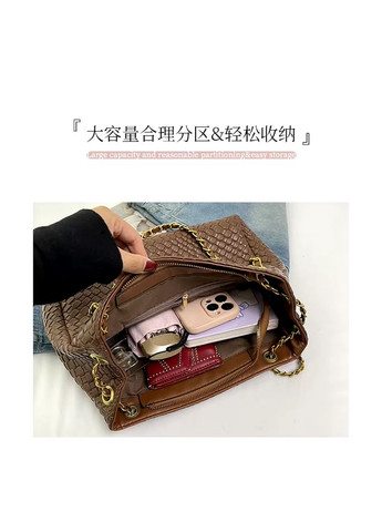 Містка стьобана сумка з декоративними ремінцями No Brand (362732533)