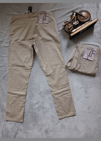 Бежевые демисезонные зауженные брюки Livergy