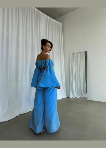 Женский костюм из американского крепа: топ + брюки с разрезами голубой 42–46 No Brand (351903690)